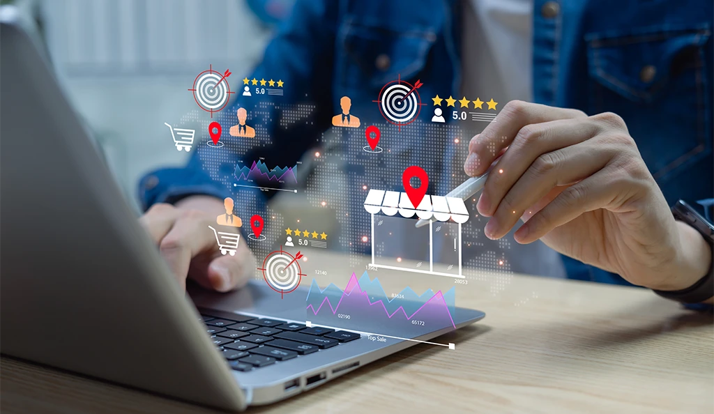 Professional using laptop with digital location pins and target icons representing local SEO services for business visibility and customer targeting