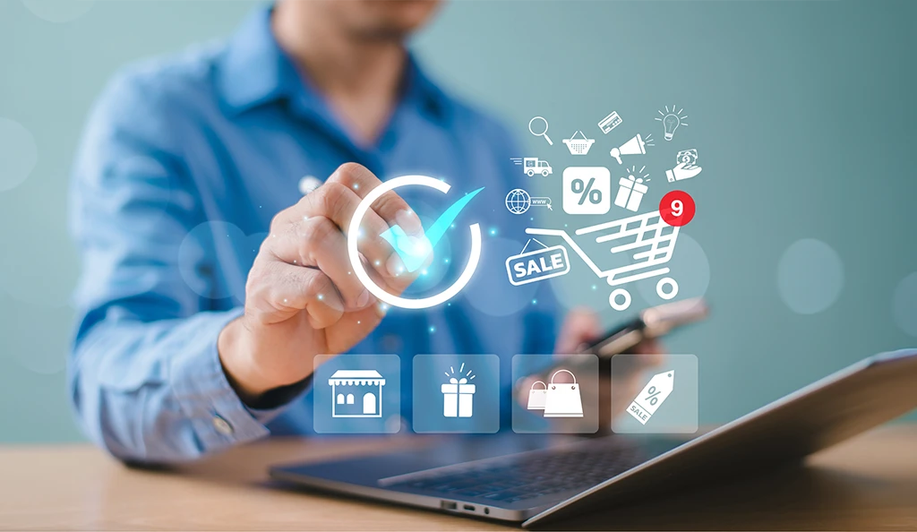 Person using a laptop with ecommerce and SEO icons representing online shopping and digital marketing.